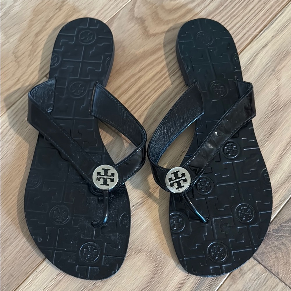 Tory Burch Black Thora Patent Leather Flip-Flops with Silver Logo